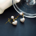 Boucles d'oreilles clous perle d'amour