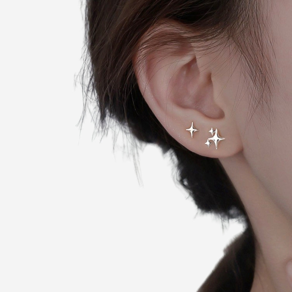 Boucles d'oreilles clous étoiles scintillantes en argent